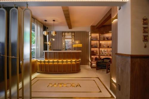 a lobby of a hotel with a baroda sign on the floor at Pandora House in Mexico City