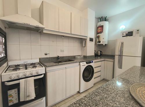 Køkken eller tekøkken på Departamento Neuquén Amoblado Premium 2-3-4 personas