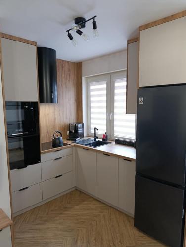 Køkken eller tekøkken på Apartament pod Groniem