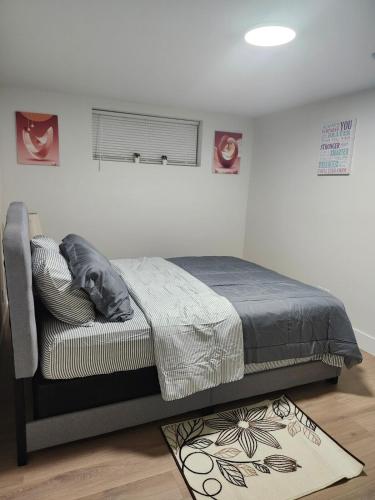 En eller flere senge i et værelse på Oasis Haven