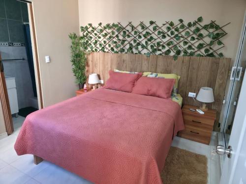 En eller flere senge i et værelse på Playa y arena