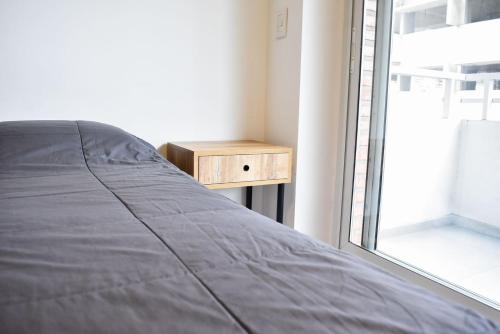 En eller flere senge i et værelse på Exclusivo Loft - Natrual - Centro