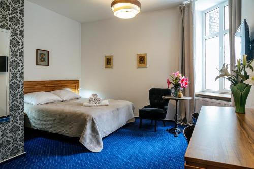 Postel nebo postele na pokoji v ubytování Apartamenty Next to Galeria Katowice