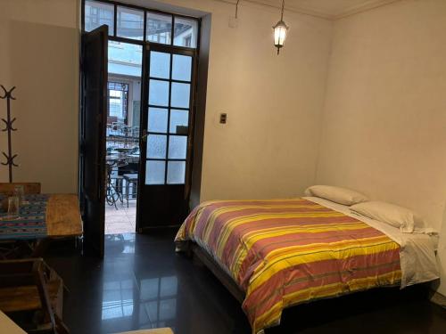 Un ou plusieurs lits dans un hébergement de l'établissement Centro Cultural Distrito