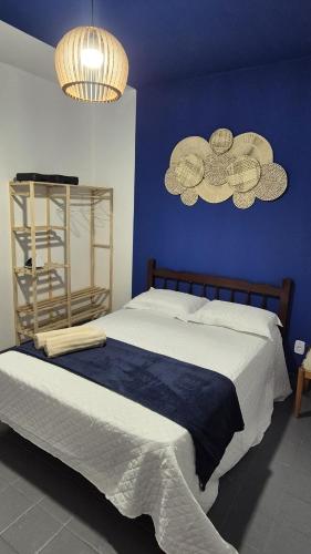 En eller flere senge i et værelse på Ap Beach House 001 - Cond Cais da Sagração - Angelim