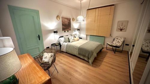 En eller flere senge i et værelse på La Hondonada