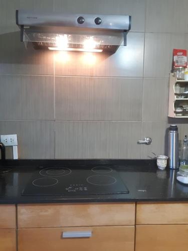 Kuchyň nebo kuchyňský kout v ubytování Hermosa casa iluminada con espacio verde y cerca del cerro