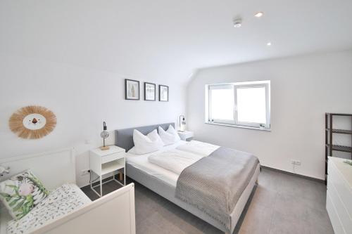 Postel nebo postele na pokoji v ubytování FeWo D&Y