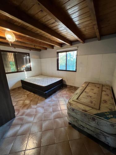 Giường trong phòng chung tại El Corte Refugio Natural