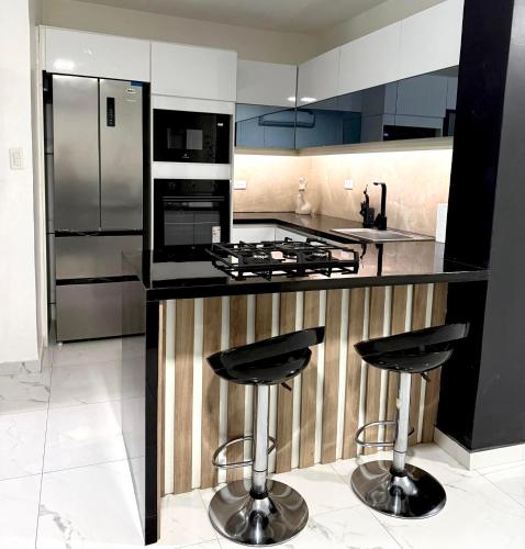 Køkken eller tekøkken på Jeanael suites 2