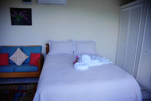 Ένα ή περισσότερα κρεβάτια σε δωμάτιο στο Memwa Villas