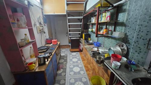 Kuchyň nebo kuchyňský kout v ubytování Sky Garden Home Single room