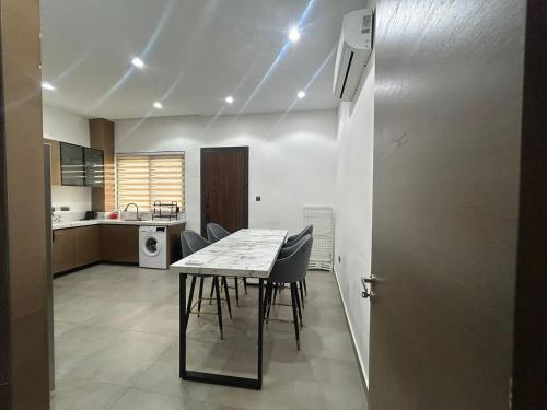 Køkken eller tekøkken på Kana Apartments