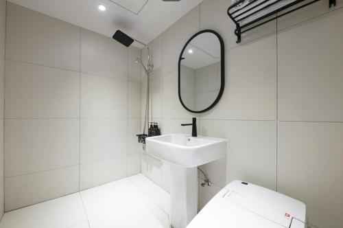 Et badeværelse på Cheongju Hotel Persona