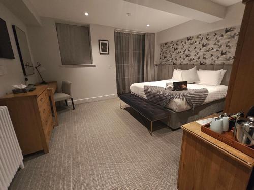 Postel nebo postele na pokoji v ubytování Trenython Manor Resort