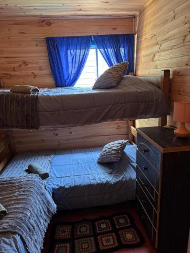 Postel nebo postele na pokoji v ubytování Cabaña punta de Lobos