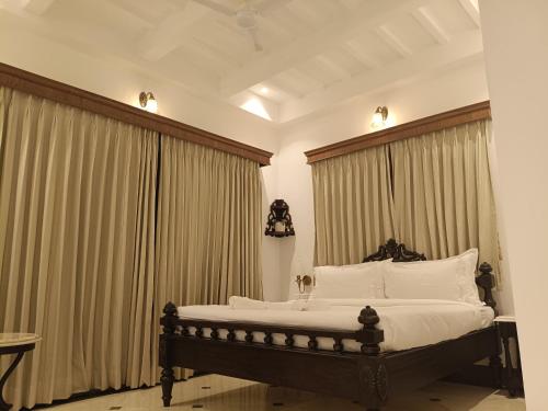 En eller flere senge i et værelse på The Ant Hill