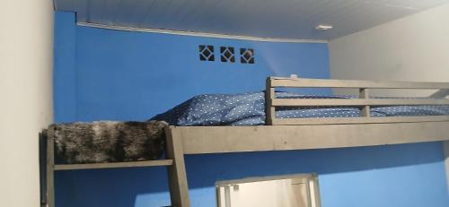 Llit o llits en una habitació de Kitnet estilo loft
