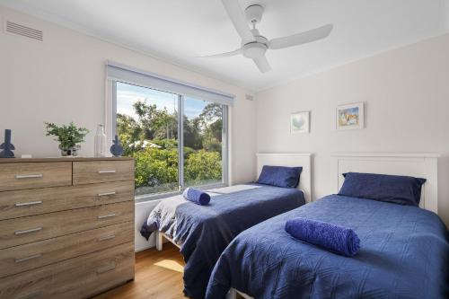 Postel nebo postele na pokoji v ubytování Retreat at Rhyll