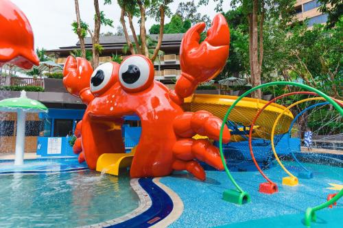 a inflatable crab on a water slide in a pool at Holiday Inn Resort Krabi Ao Nang Beach by IHG in Ao Nang Beach