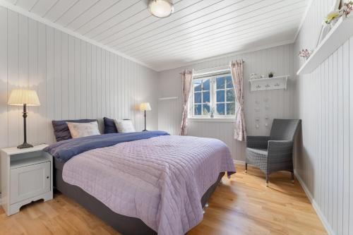 En eller flere senge i et værelse på Luxury cabin with amazing views