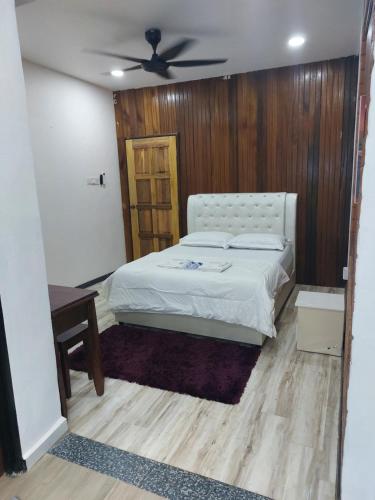 En eller flere senge i et værelse på Salsabeela Guesthouse