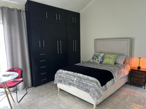 En eller flere senge i et værelse på Casa en Renta