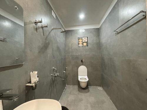 Et badeværelse på Tiger Inn Beach Resort