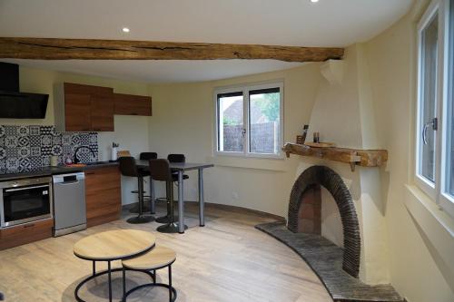 Køkken eller tekøkken på Cottage - La Petite Chaumière