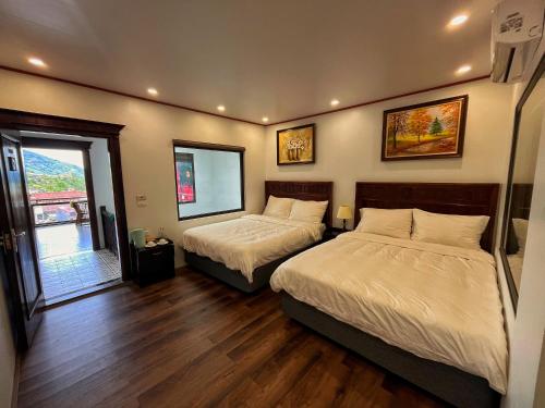 En eller flere senge i et værelse på Whisper Stay I The Hillside Villa