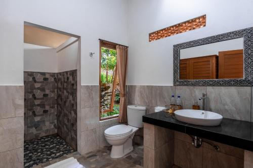 Et badeværelse på Semana Cliff Villa Ubud
