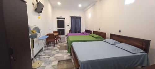 Postel nebo postele na pokoji v ubytování Onera Hotel and restaurant