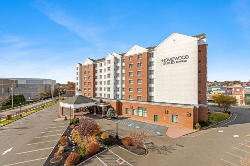 an empty parking lot in front of a building at Homewood Suites by Hilton East Rutherford - Meadowlands, NJ in East Rutherford