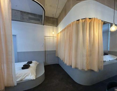 Et badeværelse på SMIRE STAY Ishigaki