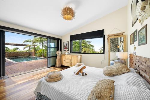 Postel nebo postele na pokoji v ubytování La Villa des Sables Noirs - L'Étang Salé