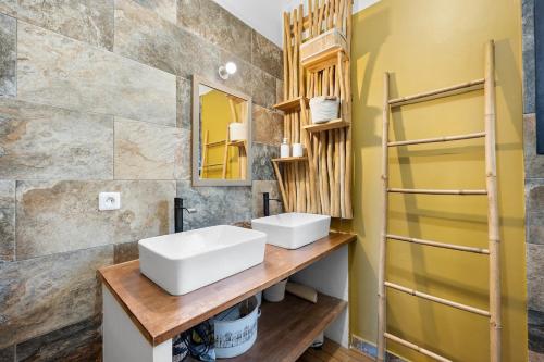 Koupelna v ubytování La Villa des Sables Noirs - L'Étang Salé