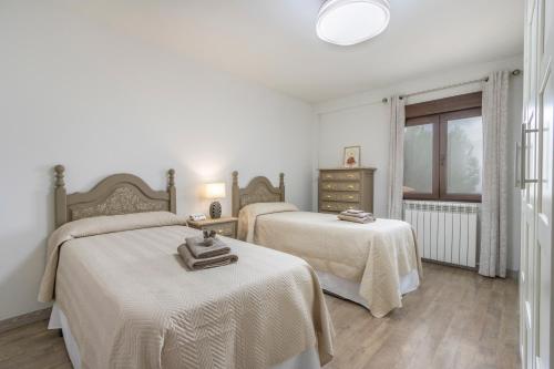 En eller flere senge i et værelse på El Cierzo de Sediles