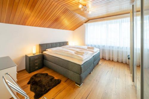 En eller flere senge i et værelse på Penthouse Matterhorn Vista