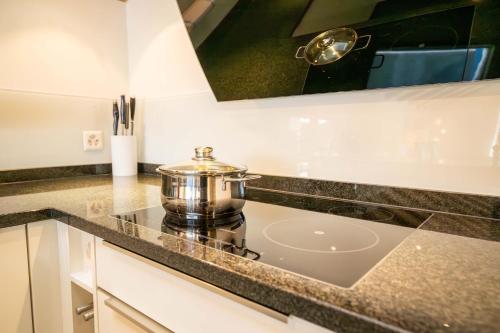 Køkken eller tekøkken på Penthouse Matterhorn Vista