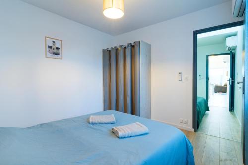 Giường trong phòng chung tại Gîte du Cellier - Jardin et terrasse