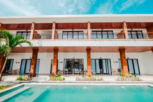 Imagen de la galería de Kubu Dangin Guest House Kerobokan, en Seminyak