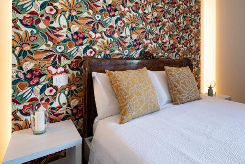 Postel nebo postele na pokoji v ubytování Locanda Vecchio Mulino