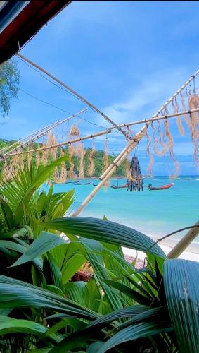 a view of a beach with a view of the ocean at Crystal Bungalow DELUXE in Ko Phangan