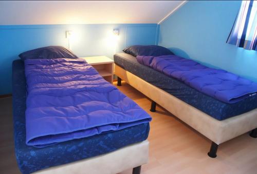 Giường trong phòng chung tại Cardium32