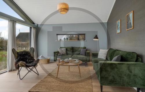 Et opholdsområde på Cozy Home In Sæby With Wifi