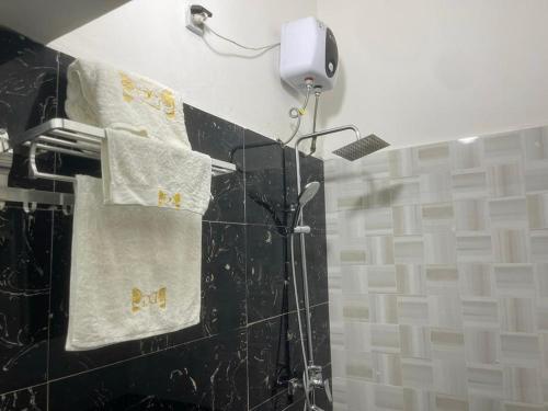 Phòng tắm tại Hotel Divines Graces Residence Inn