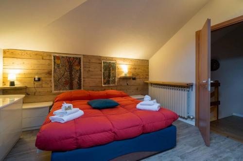 En eller flere senge i et værelse på Maison Mignon