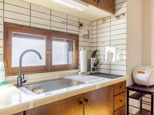 Η κουζίνα ή μικρή κουζίνα στο LIT’S INN Sapporo