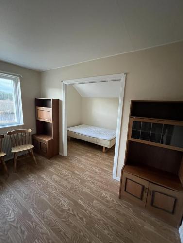 Postel nebo postele na pokoji v ubytování Uddeholm Apartment