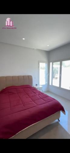 En eller flere senge i et værelse på Hammamet